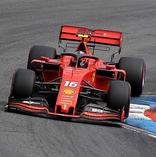 A red Scuderia Ferrari sits on a racing track, an example of Shell Helix Ultra’s Innovation Partnership