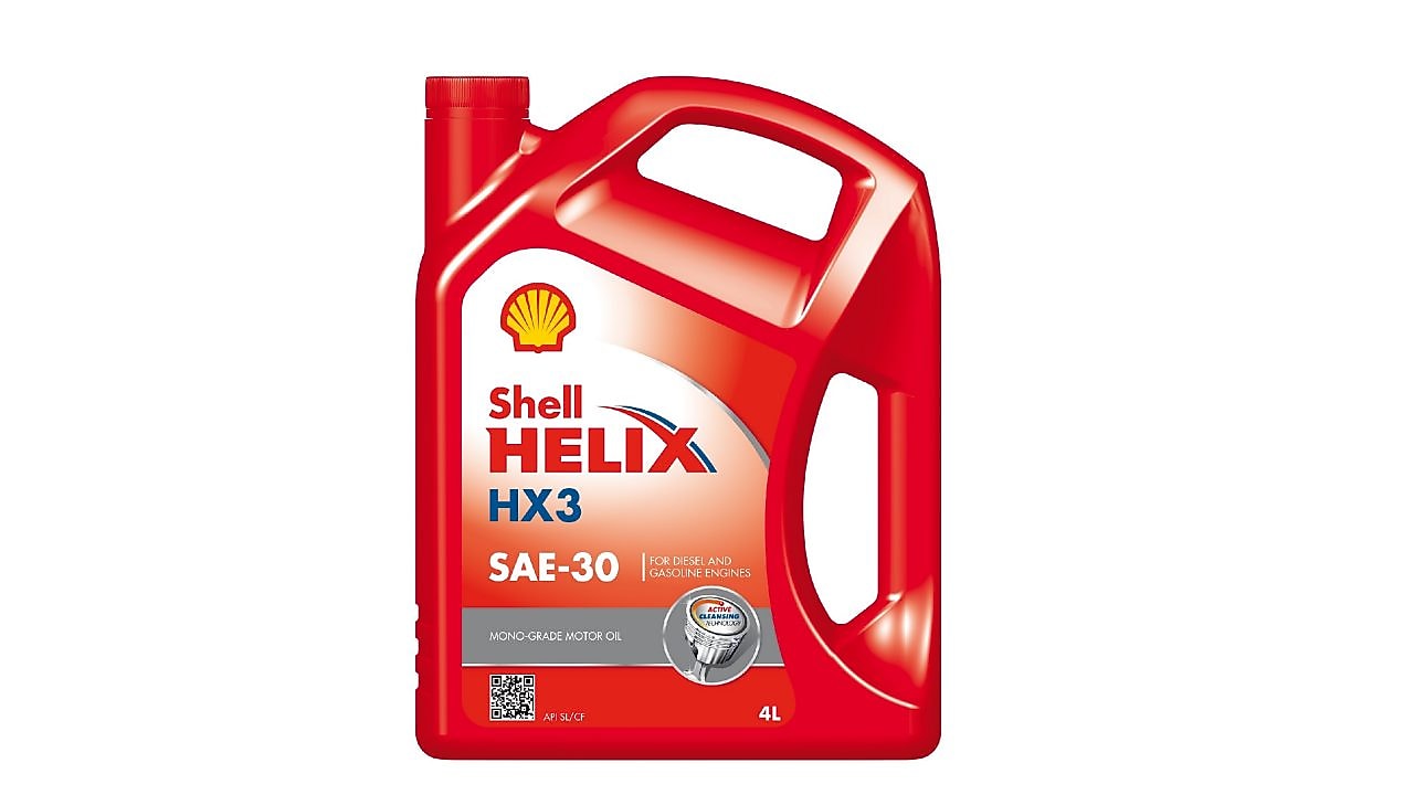 Shell Helix HX3 SAE 30 4-liter motor oil bottle with a high-contrast background.