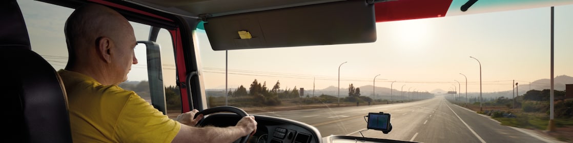 truck driver driving on empty road