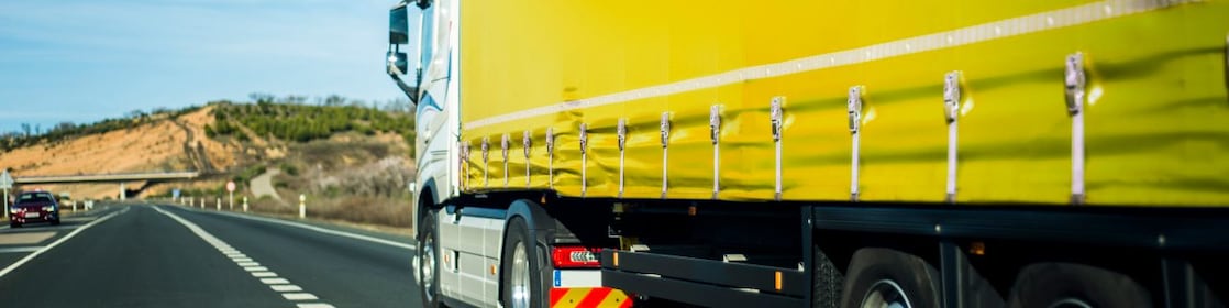 Yellow truck on the road