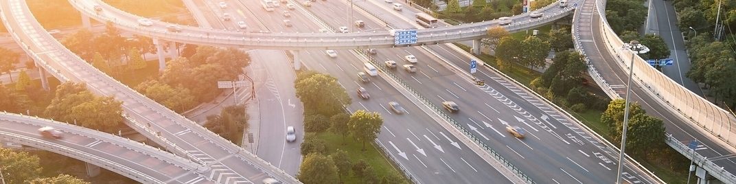 Cars driving on a complicated highway infrastructure with over and under passes