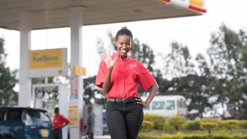 shell kenya forecourt attendant assisting a customer providing quality service and support